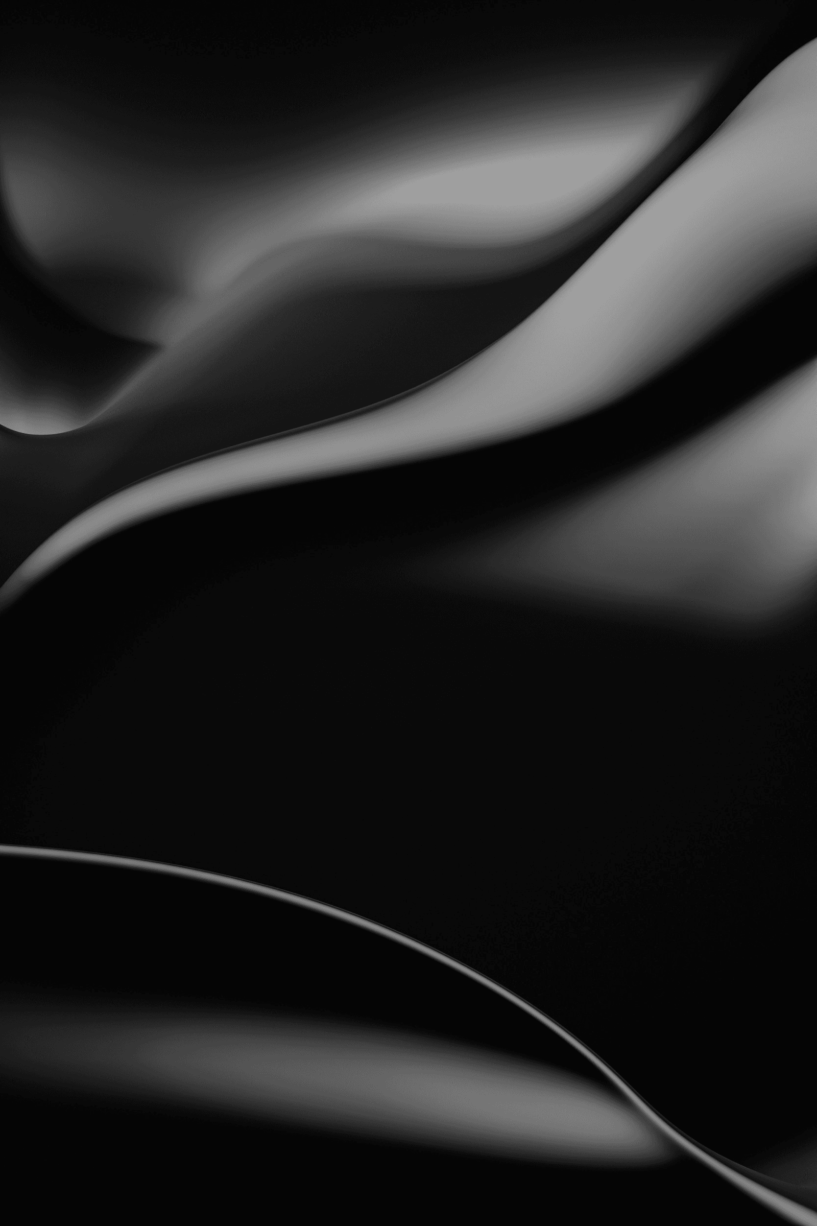 Abstract dark draped fabric with flowing curves and soft directional light